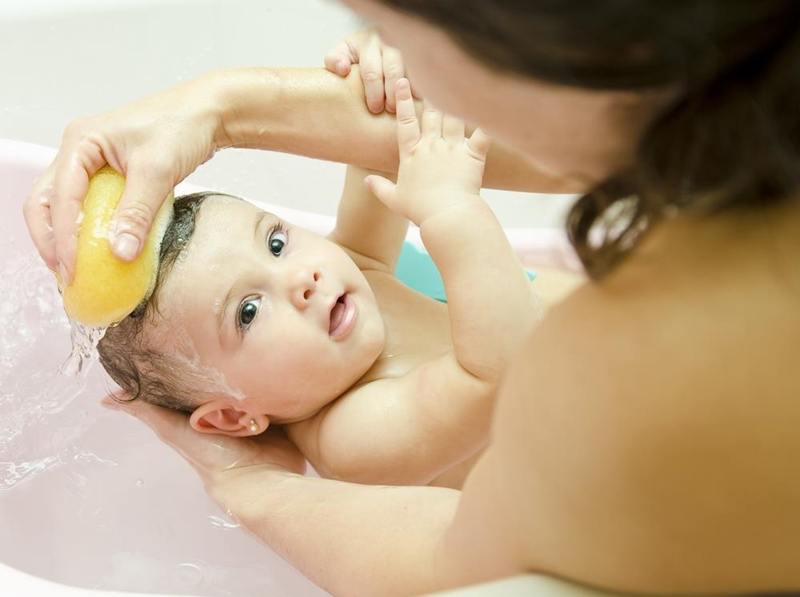 cute baby bathing